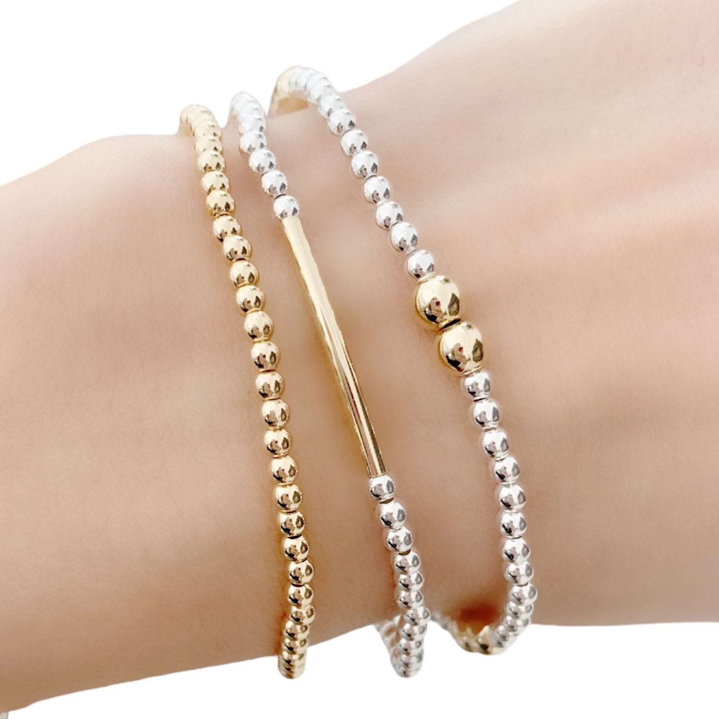 This chic and modern Dainty Gold Bracelet adds a hint of glamour to any look. Crafted from 14k gold filled Beads and sterling silver. Add a touch of elegance to your day!